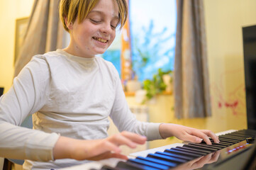 Boy with chickenpox playing piano