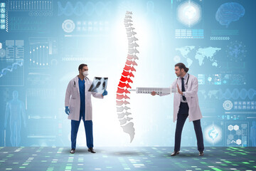 Medical concept with doctors and spine