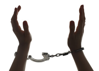Freedom concept. Woman with handcuffs on white background, closeup