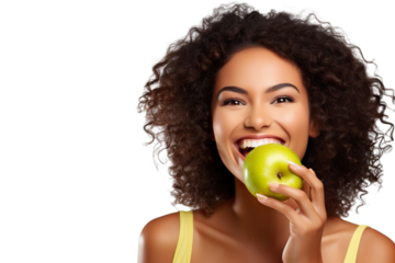 closeup beautiful happy woman in bright yellow top biting green crispy apple isolated on white background, concept of happiness, healthy food and losing weight