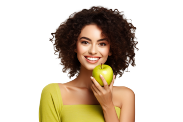 closeup beautiful happy woman in bright yellow top biting green crispy apple isolated on white background, concept of happiness, healthy food and losing weight