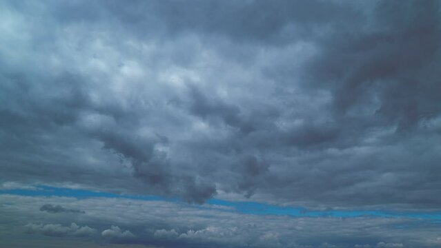 Rainy Clouds. Clouds Float Quickly Across Gloomy Gray Sky. Sky Before Storm. Storm Overcast Sky Cloud Scape.