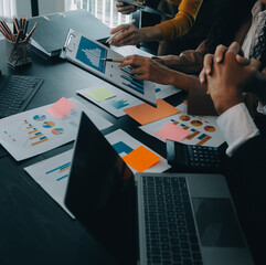 Business team collaboration discussing working analyzing with financial data and marketing growth...