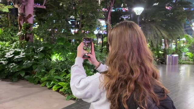 Doha, Qatar Garden with tropical plants inside Hamad International Airport in Doha, Qatar 02.01.2024 High quality 4k footage