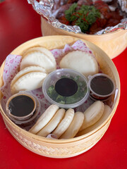 many bun in bamboo basket