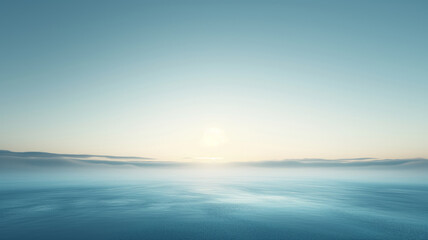 Fototapeta premium Misty Sunrise over a Calm Ocean