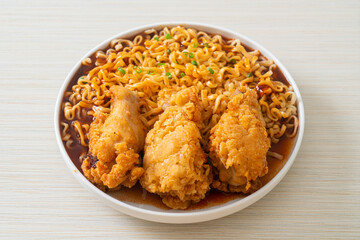 Korean instant noodles with fried chicken or Fried chicken ramyeon
