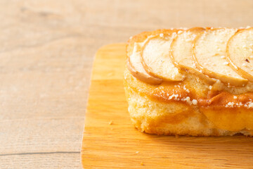 apple loaf crumbled on wood board