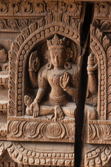 The statue of god carved at one of the temple of the Patan Durbar Square, Patan, Nepal