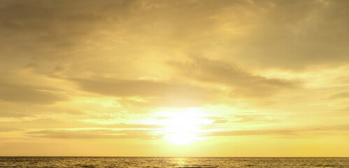 Panoramic skyline view The sun rose in the morning sky with colorful clouds. and beautiful cloud patterns In the soft light In the morning at the sea
