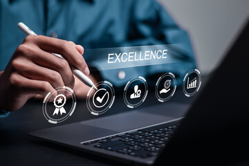 Excellence concept. Businessman use laptop with excellence icon for quality service. Best excellent...