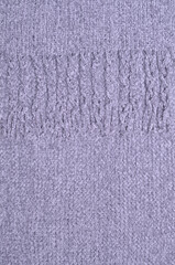 Gray knitted yarn background.