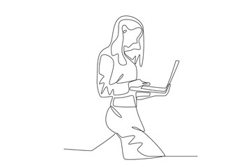 A woman works while standing