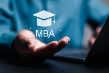 MBA, Master of Business Administration program concept. Businessman use laptop with virtual MBA...