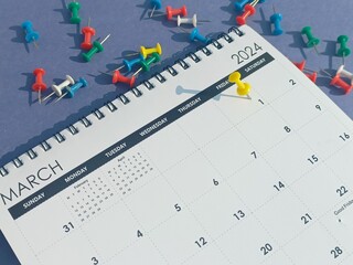First march 2024 calendar marked with push pin concept of business events planning and reminder 
