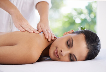 Relax, hands and massage woman at spa for skincare, peace and calm to rest at luxury resort for beauty. Table, therapist and young person at salon for healthy body, treatment and pamper for wellness