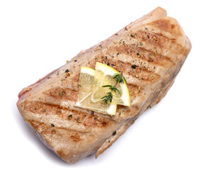 grilled cooked piece of tuna fillet isolated on white background
