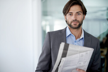 Business man, portrait and newspaper for information, article and story update in office. Male...