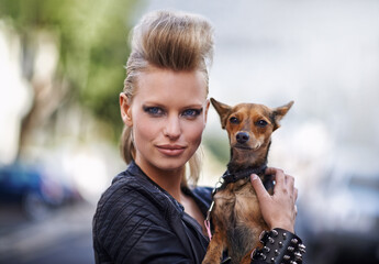 Woman, portrait and punk fashion with dog, edgy rock hairstyle and cool in funky clothes with care...