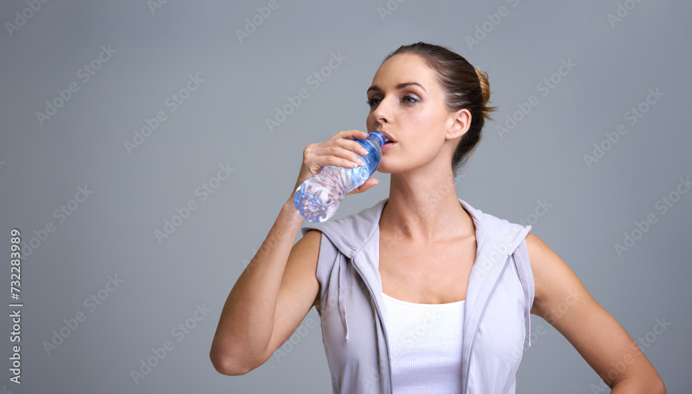 Sticker Woman, fitness and drinking water for hydration or natural sustainability on a gray studio background. Face of thirsty female person or athlete with mineral drink in rest, break or recovery on mockup