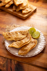 Pescadillas. So called when they are stuffed with fish such as tuna, popular during the Lent season. They are known as Golden Quesadillas when they are filled with ingredients such as meat or potatoes