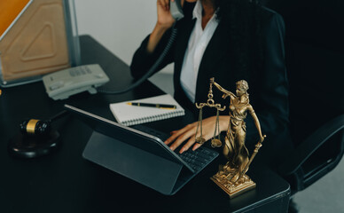 Judge gavel with Justice lawyers having team meeting at law firm background. Concepts of Law and Legal services.