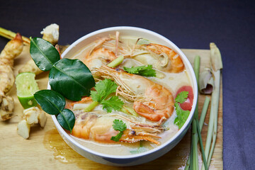 Spicy Tom Yum Goong and sour Thai food with ingredient in a bowl