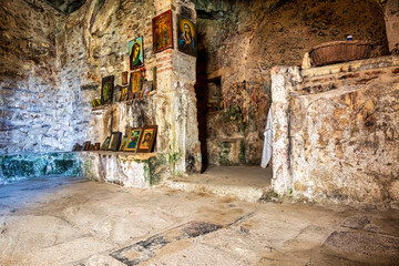 Inside the monastery enclosed by Davelis cave in Penteli, a mountain to the north of Athens, Greece