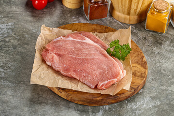 Raw pork schnitzel for cooking