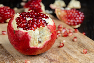 red ripe pomegranate with red grains