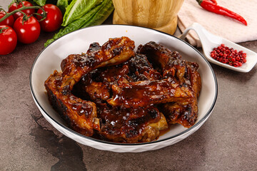 Grilled pork ribs in barbecue sauce