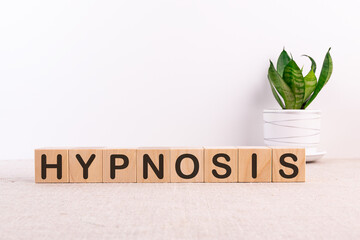 HYPNOSIS word made with building blocks on a light background