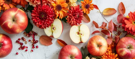 The table displays a mix of colorful elements including apples, flowers, leaves, and berries. It showcases a creative blend of nature's offerings such as fruits, flowering plants, and natural foods.