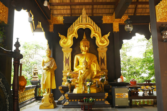 Golden Buddha sitting Decorated in the pavilion At Wat Phra That Doi Phra Chan for Buddhists to worship. Located at Lampang Province in Thailand.