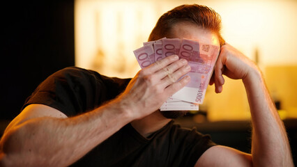 Sad man wipe tears with stack of euro money sarcastic meme