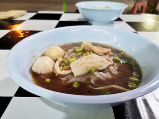 Thai food, Thai street food, noodles contain pork and pork meatballs.