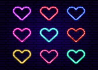 set of glowing neon colorful hearts vector illustration