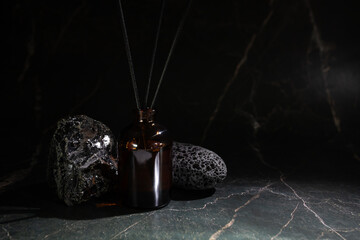 Aroma diffuser with natural stones, cozy spa ambiance, fragrance therapy, relaxation