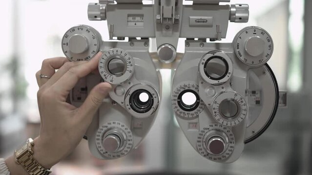 Phoropter eye test with hands 