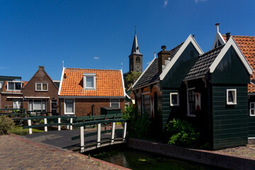 Beautiful fishing village of Volendam with with its typical houses in a sunny day. Netherlands.