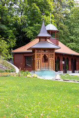 Old wooden building of pump room of Jan mineral healing water, Krynica-Zdroj, Poland