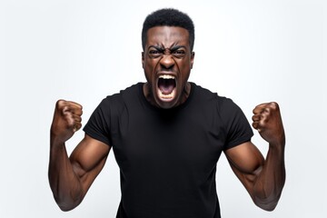 A man with his fists raised in the air, showing determination and strength. This image can be used...