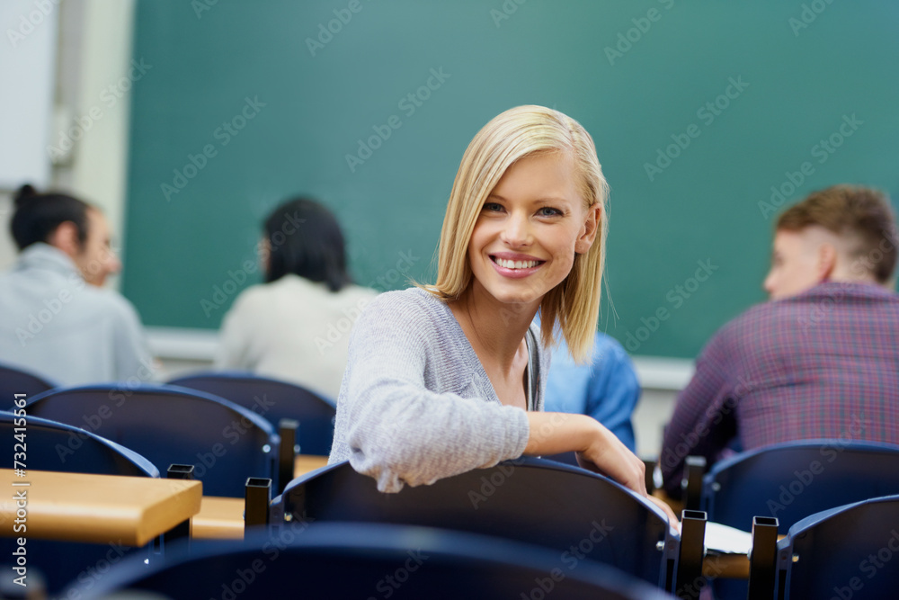 Poster University student, portrait and education at classroom desk in London for english lecture, knowledge or scholarship. Female person, face and academy for certificate or diploma, teaching or lesson