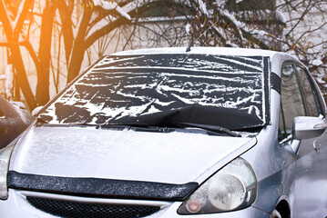 Car windshield cover from freezing winter weather including snow, frost and ice.  Frost guard windshield car cover. Windshield protector, snowcover. .