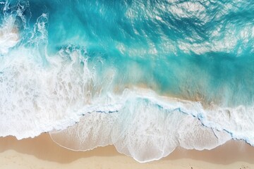 Obraz premium An aerial view of a beach with a surfboard. Perfect for travel, vacation, and beach-related themes