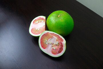 Pomelo A Citrus Fruit Larger and Sweeter Than Grapefruits, with a Thicker Rind and More Pith. Its Flesh Ranges from White to Pink to Red, Offering a Mild, Less Bitter Flavor Compared to Grapefruit