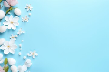 A vibrant blue background with beautiful white and pink flowers. Perfect for adding a pop of color to any project or design