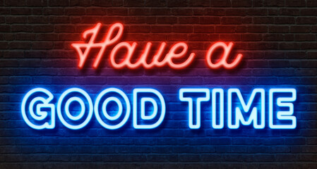 Obraz premium Neon sign on a brick wall - Have a good time