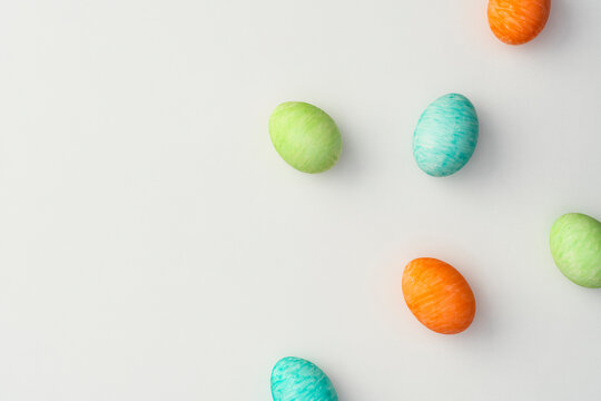 Hand painted colorful easter eggs on white background.