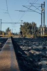 Lower detail of railway tracks.
